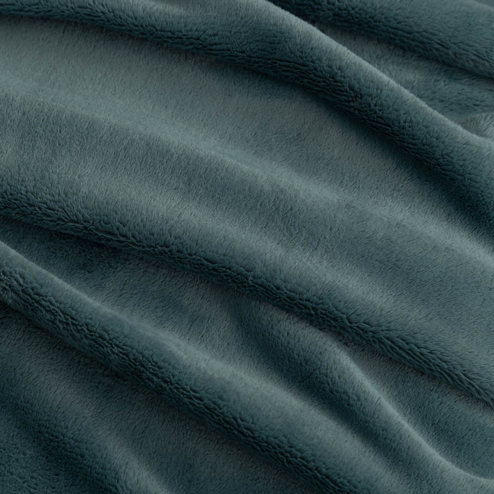 Close up of a dusk blue PrimaLush throw, displaying the silky smooth and plush texture.
