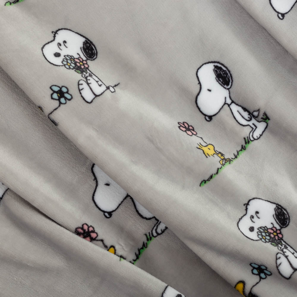 Fabric with cartoon character pattern on a gray background