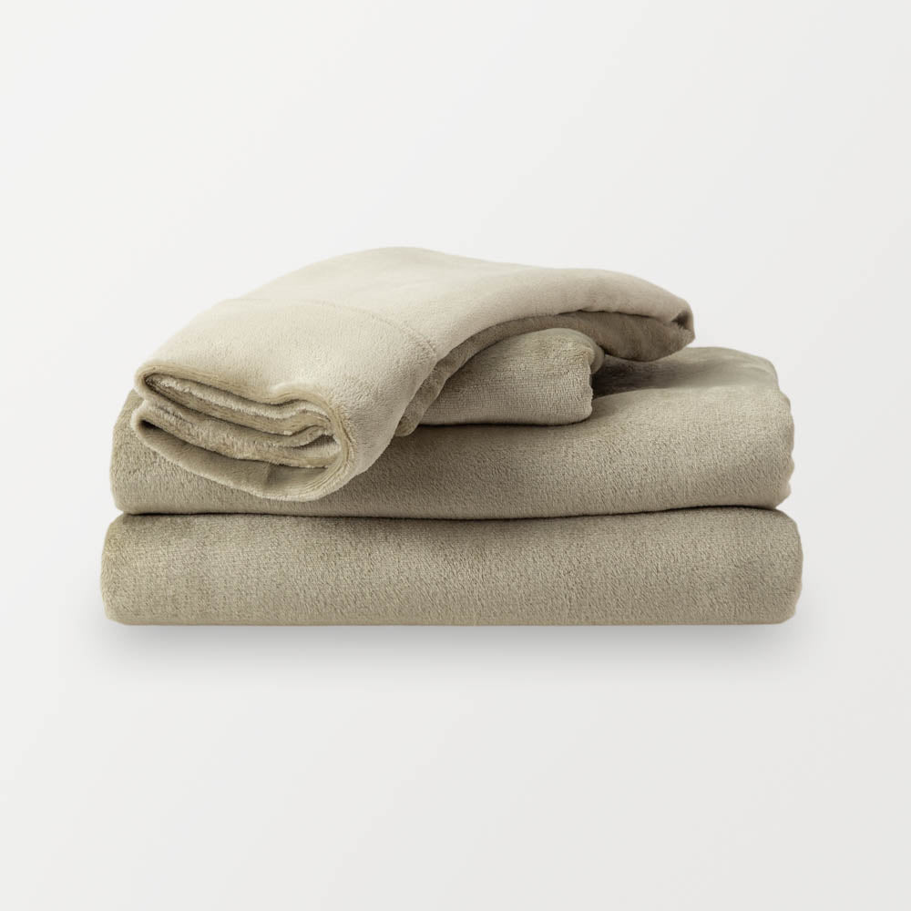 Folded Dry Sage sheet set on a white background.