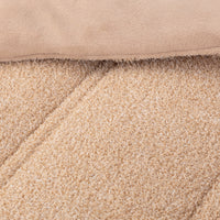 Close up shot to show the two reversible fabrications of the Retro Plush comforter set in Sumatra blend.