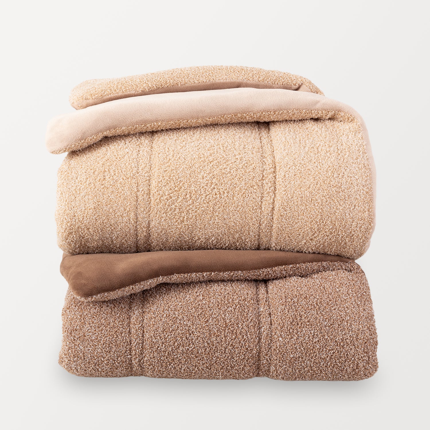 Two folded folded Retro Plush comforters stacked in a clean, organized display on white background.