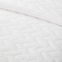 Close-up of the  White VelvetLoft quilting patten detail and VelvetLoft® fabric, highlighting the silky, textured design.