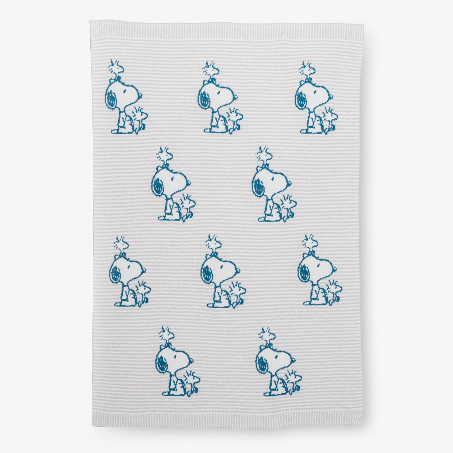 Peanuts striped MellowSoft Throw laid flat on a white surface.