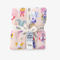 Krissy Mast Artist Series printed dog print throw folded neatly on a white surface.