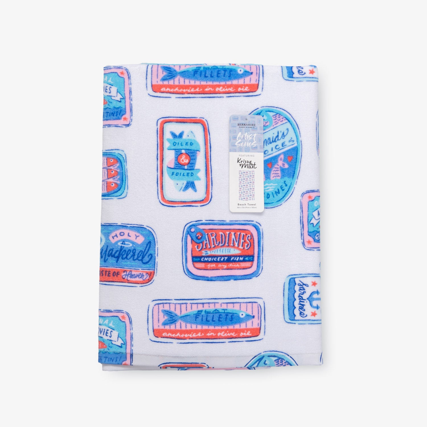 Krissy Mast Sardine printed beach towel folded neatly on a white surface.