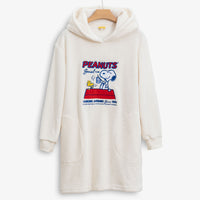 Peanuts social club embroidered lounge hoodie hung on a hanger on a white surface.