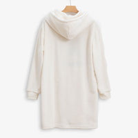 Peanuts social club embroidered lounge hoodie hung on a hanger on a white surface.