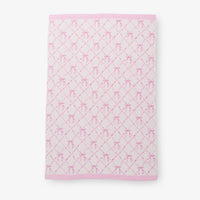 Krissy Mast Mellowsoft Bow Throw laid flat on a white surface.