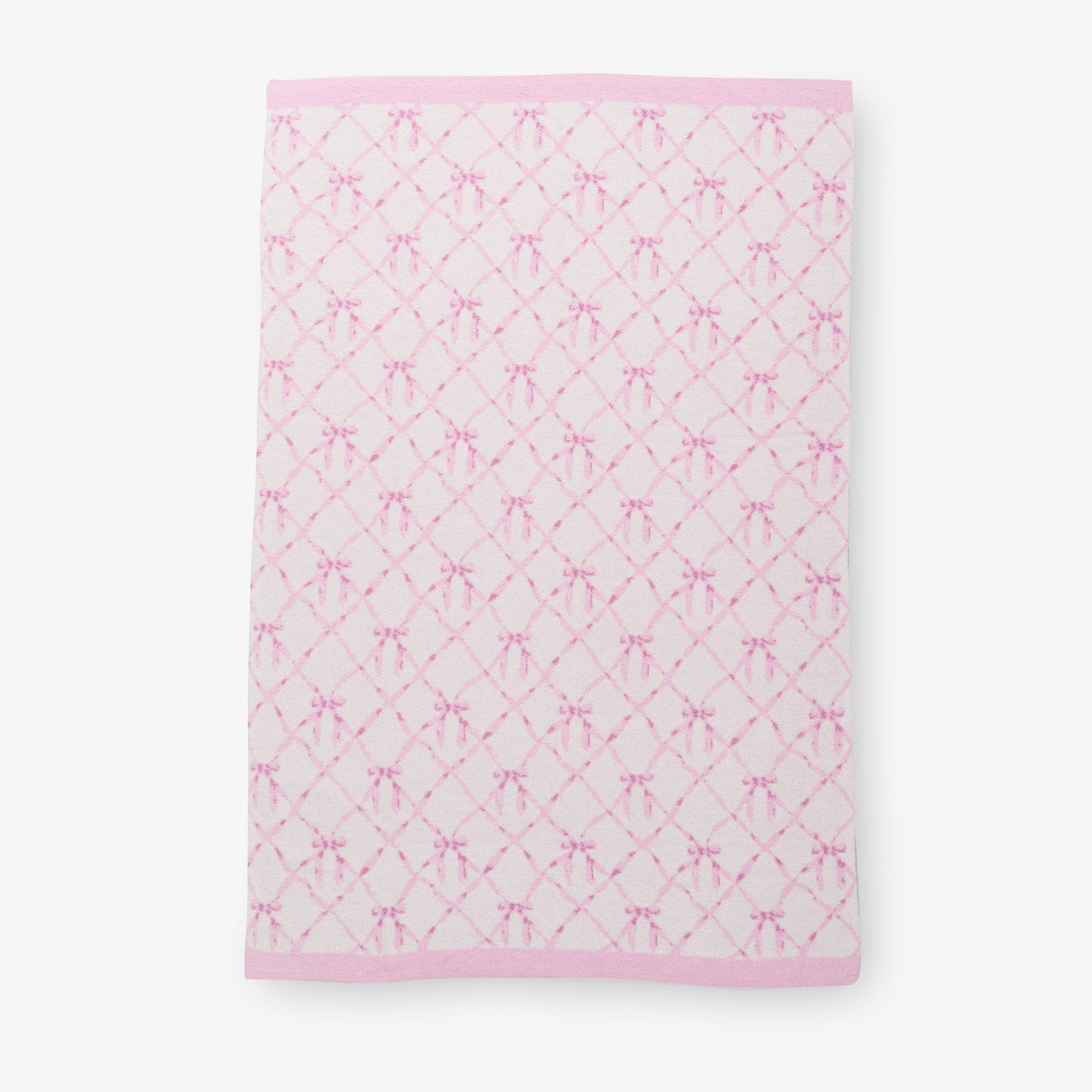 Krissy Mast Mellowsoft Bow Throw laid flat on a white surface.