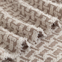 Close-up of textured fabric with a geometric pattern