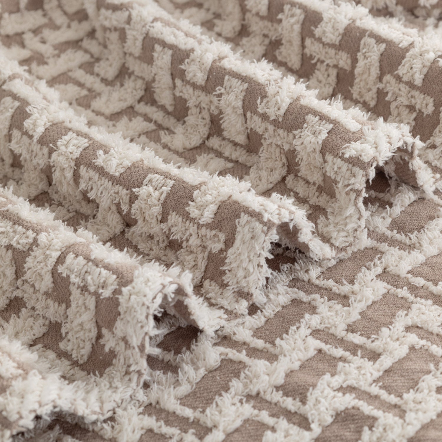 Close-up of textured fabric with a geometric pattern