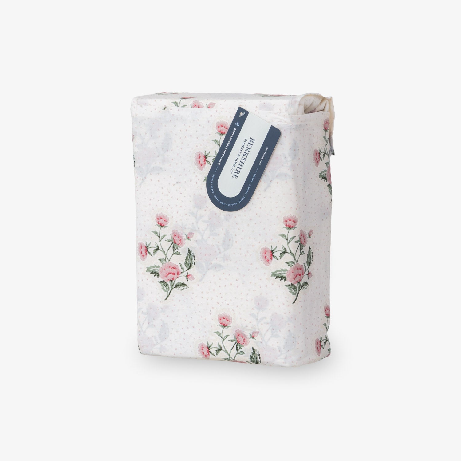 Floral-patterned product packaging with a visible brand label on a white background