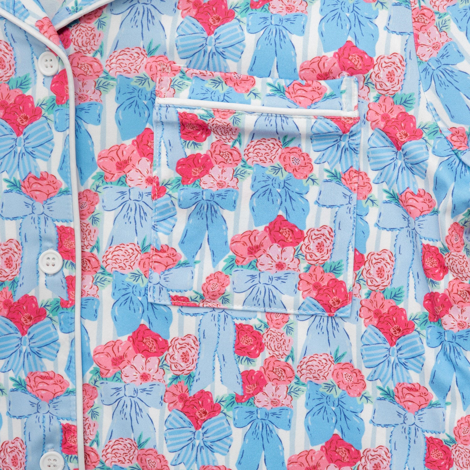 Krissy Mast floral printed lounge set laid flat on a white surface.