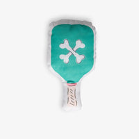Pickleball pups dog toy on a white surface.