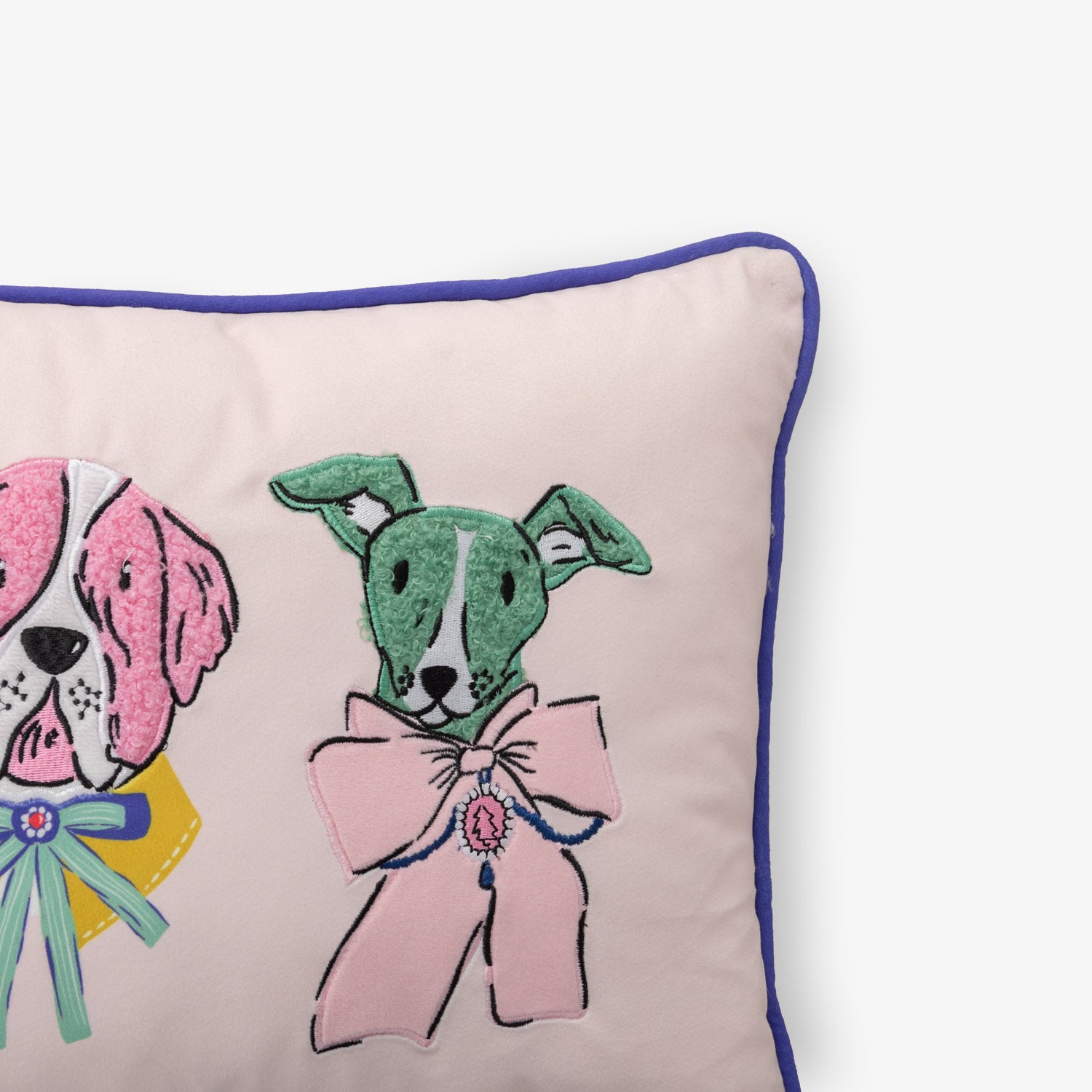Krissy Mast dog printed pillow sitting on a white surface.