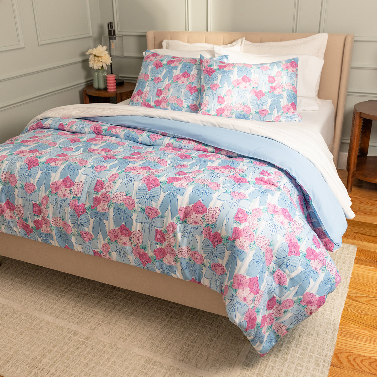 Floral bedding set on a bed in a bedroom setting