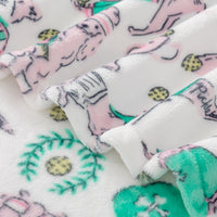 Close up of pickleball pups plush velvety printed throw.