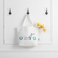 Pickleball pups tote hanging on a hook.