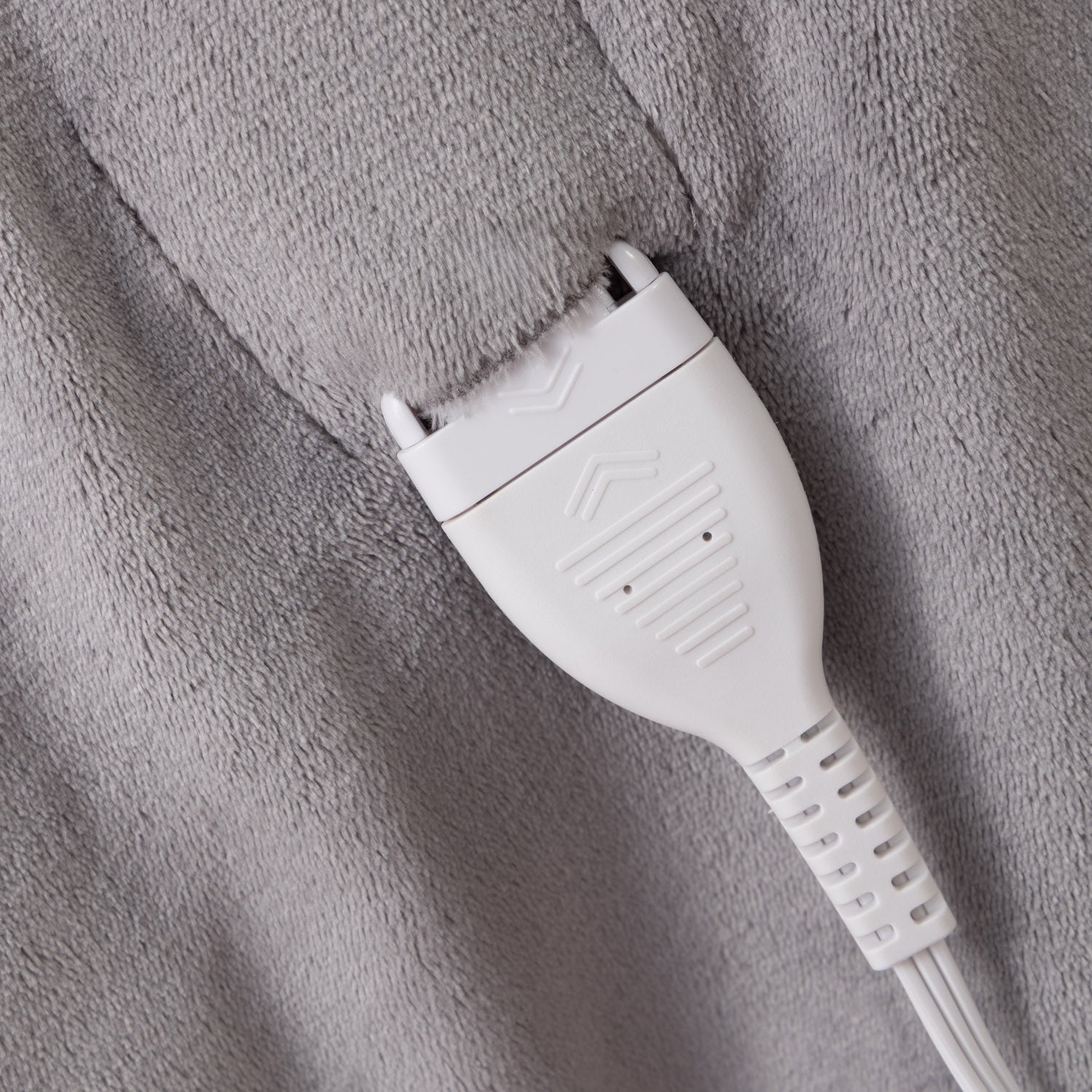 White electronic device on a gray textured surface