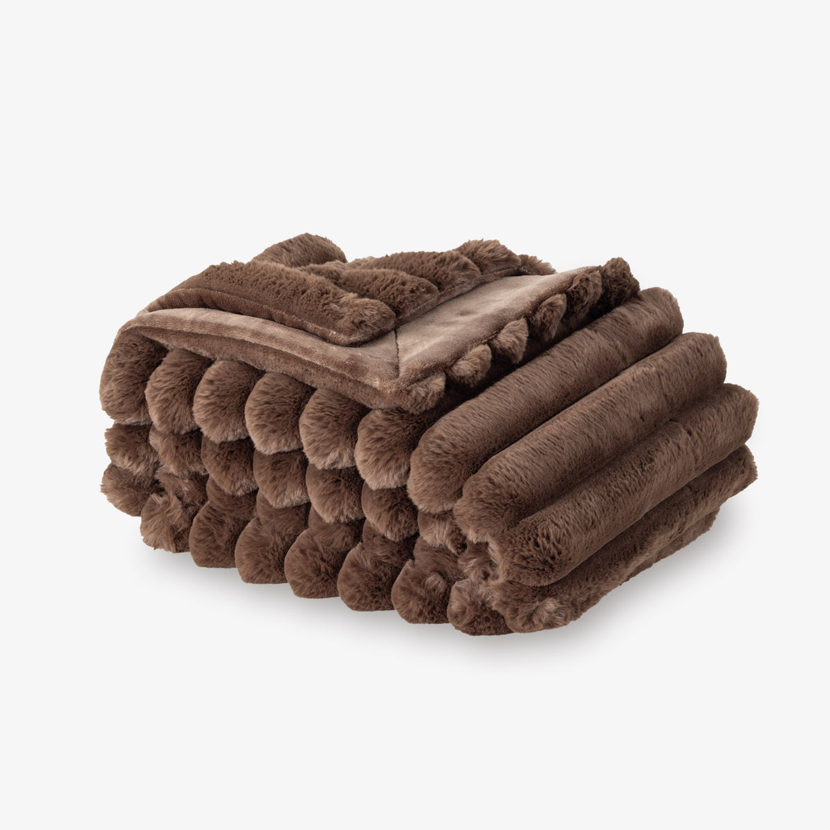 Folded brown plush blanket on a white background