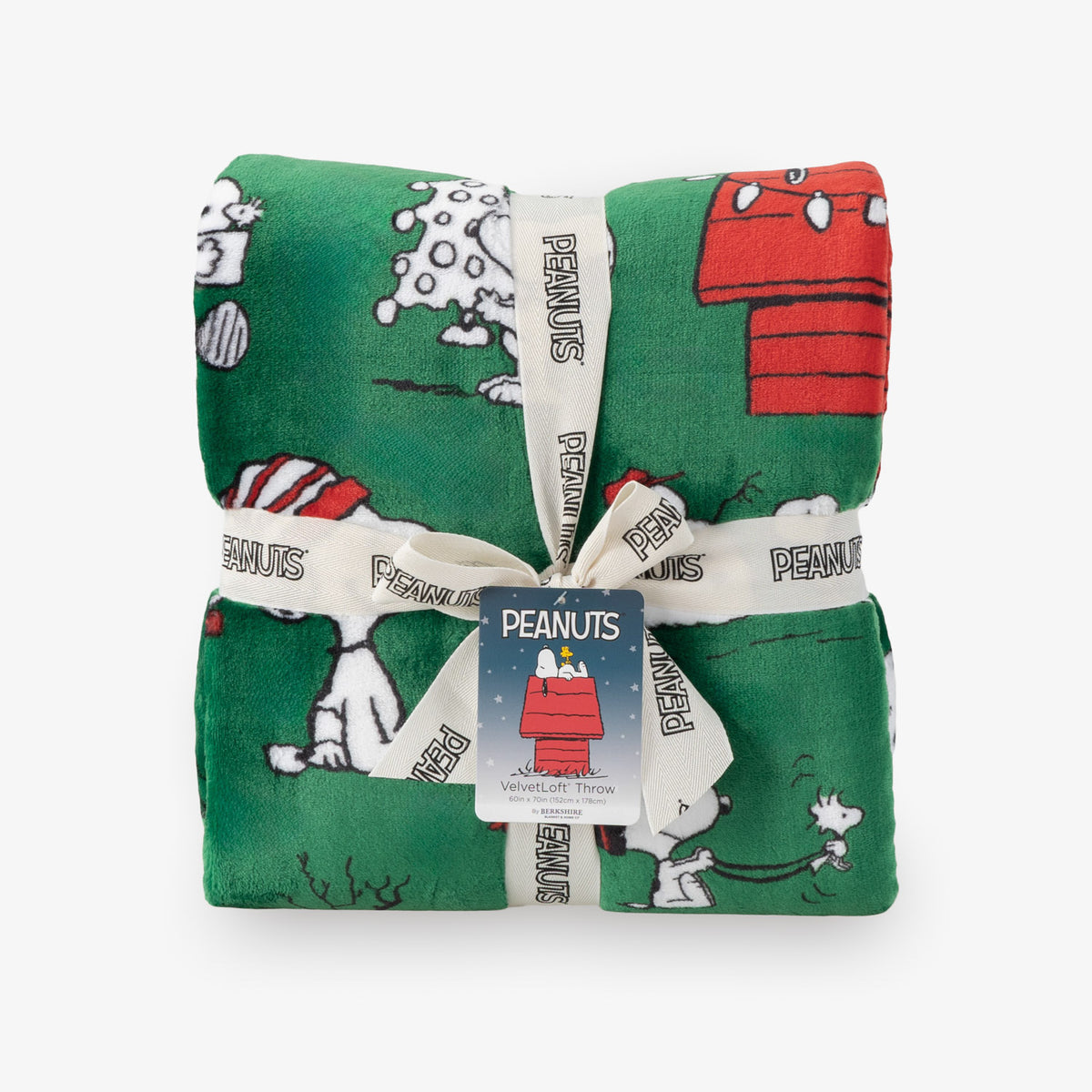 Folded Peanuts-themed fabric with a tag on a white background