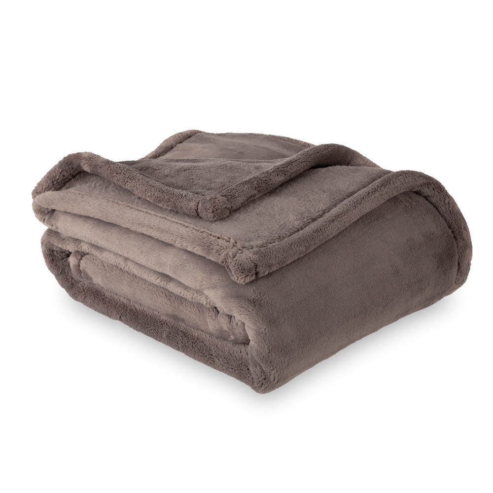 A greyPrimaLush Throw folded neatly on a white surface.