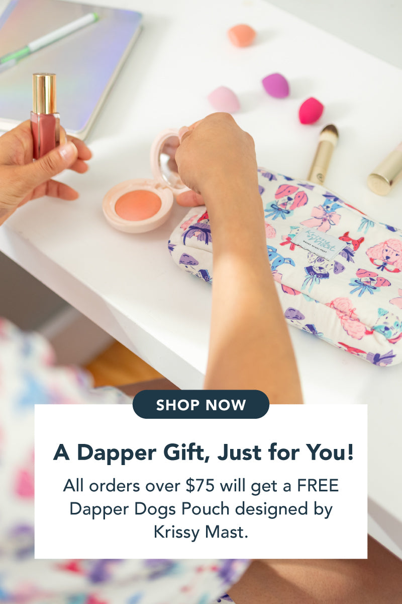 Title: A Dapper Gift, Just for You!

Sub-Title: All orders over $75 will get a FREE Dapper Dogs Pouch designed by Krissy Mast.

Image: Girl using a zipper pouch to store supplies and makeup