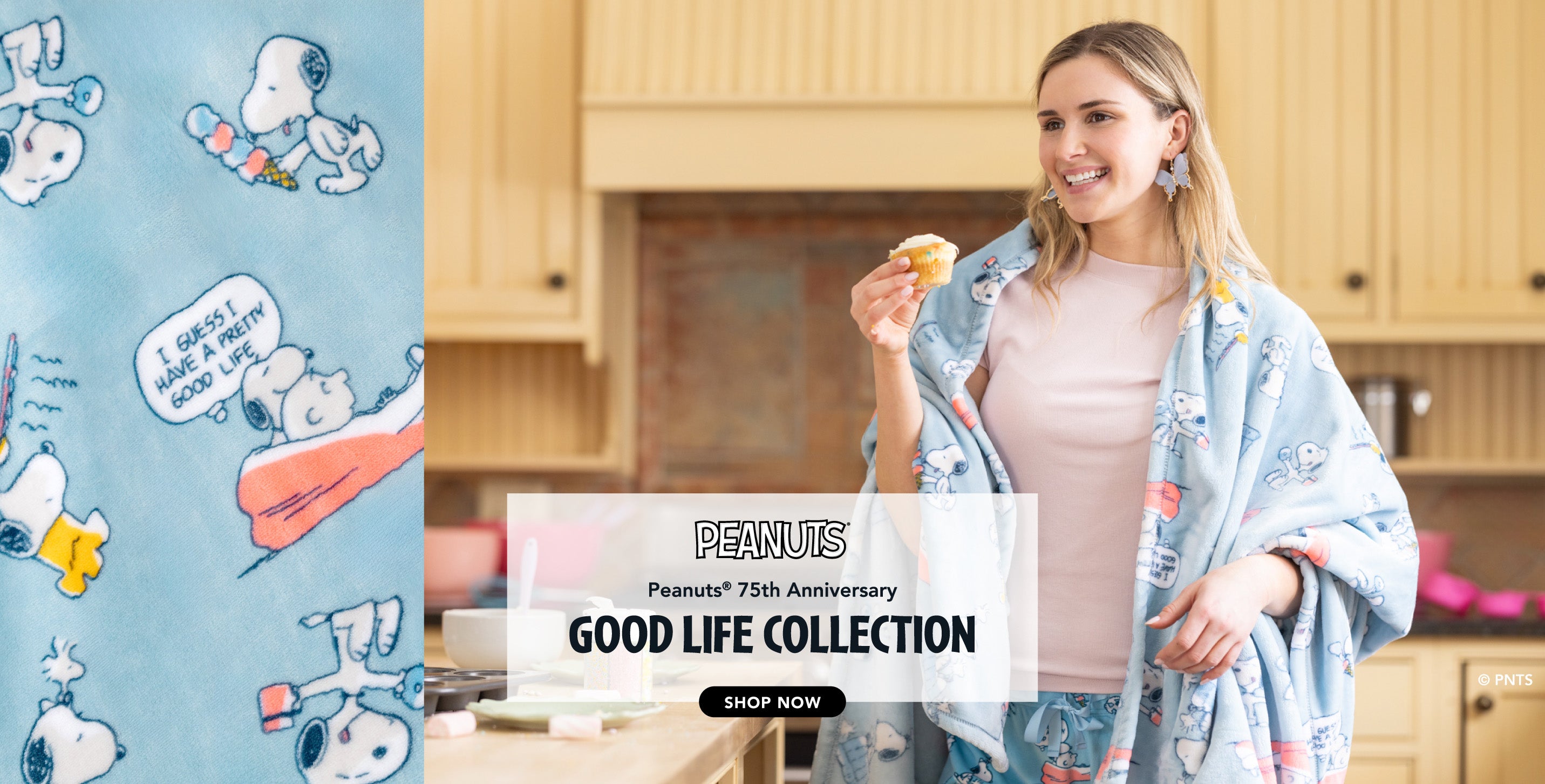 Peanuts® 75th anniversary the Good Life Collection. Photo of a girl in a kitchen baking sweets, featuring a print with goodies.