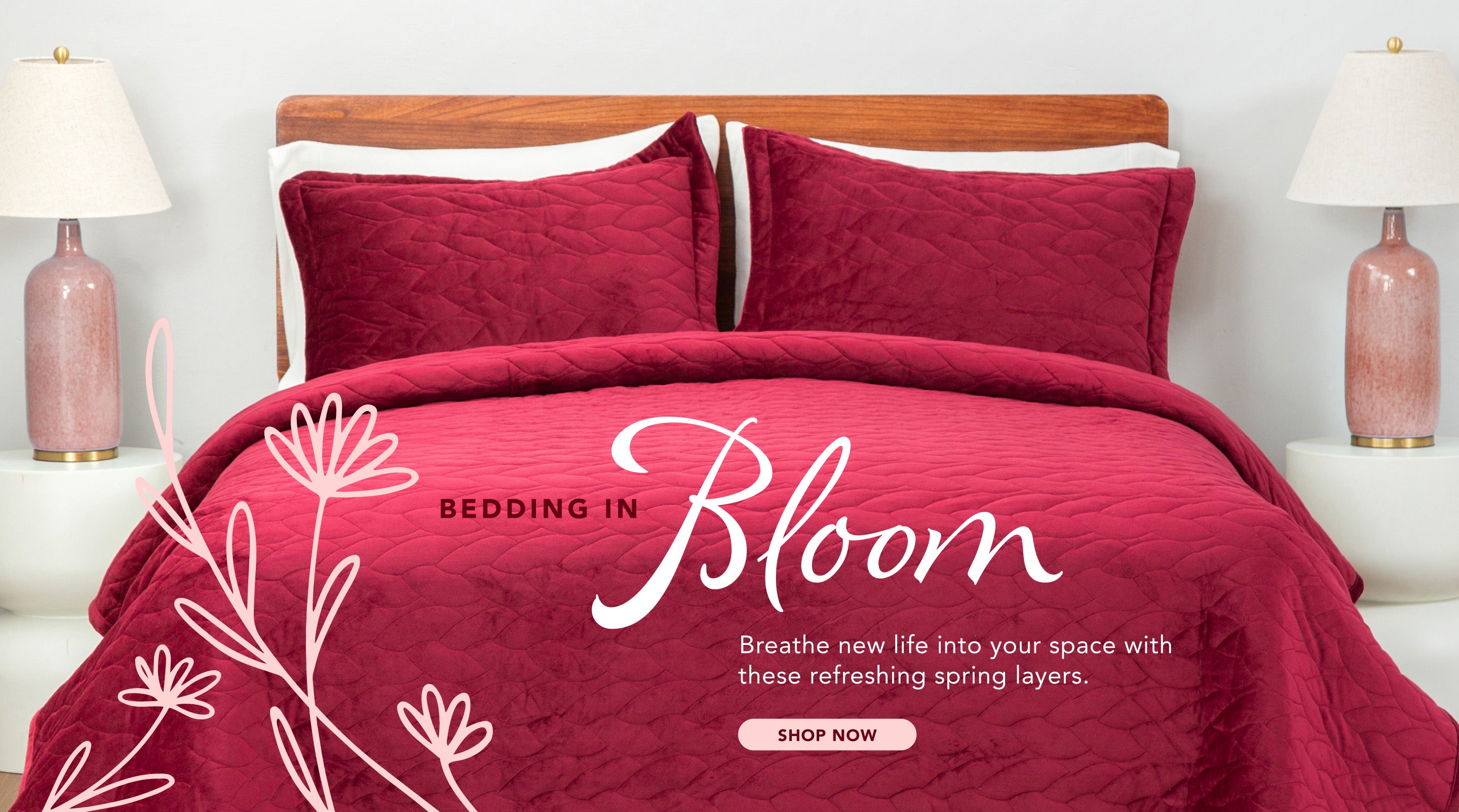 Bedding in Bloom. breathe new life into your space with these refreshing spring layers. Shop now. Image of a bed with a red quilt. 