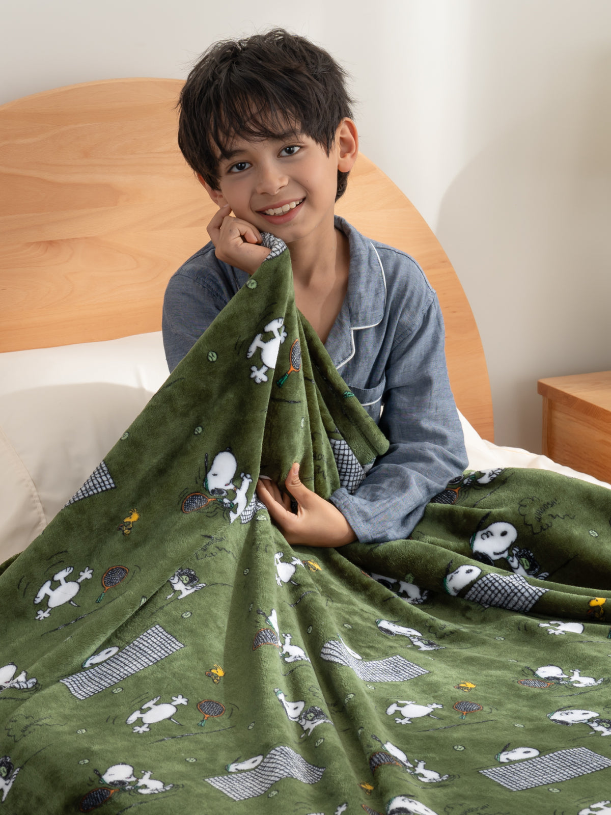 Peanuts collection image featuring our Peanuts VelvetLoft Throw in our Tennis Star print.
