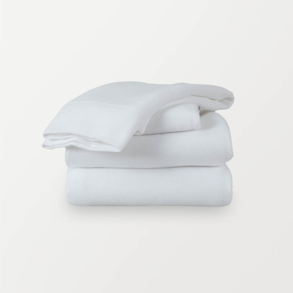 A stack of white sheets neatly folded on a white background.