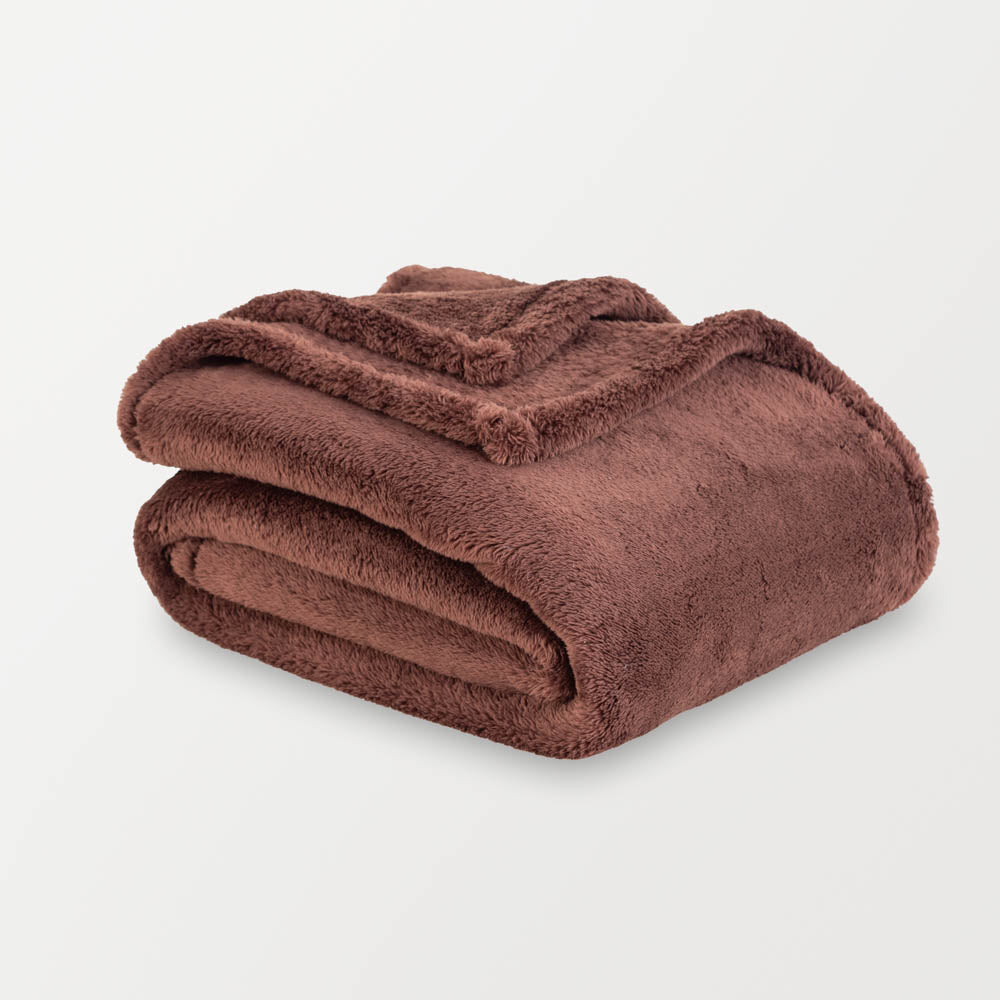 A folded brown Extra-Fluffy Throw displayed on a white background.