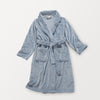 A blue VelvetLoft Luxury Plush Spa Robe laid flat on a white surface.