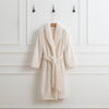 Cream Extra Fluffy Robe hanging from hook