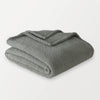 Farmhouse Sage Retro Comfort Plush Throw folded and displayed on a white surface.