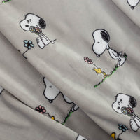 Fabric with cartoon character pattern on a gray background