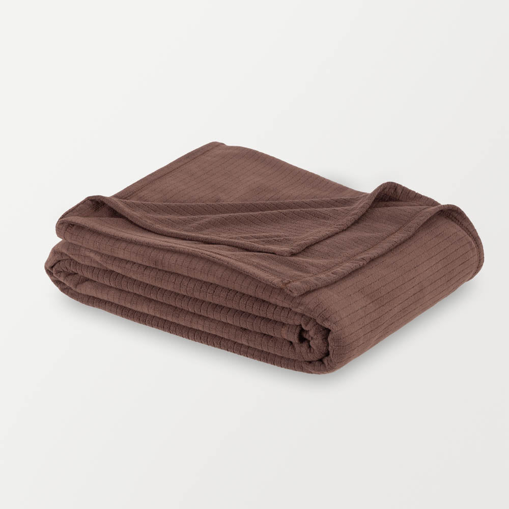 Folded brown Polartec Softec Microfleece blanket on a white background.