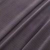 Close-up of the microfleece material of the blanket in dark gray, highlighting its soft texture.