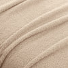 Close-up of beige fabric with visible texture