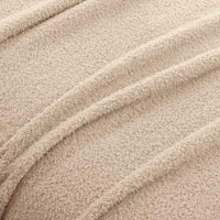 Close-up of beige fabric with visible texture