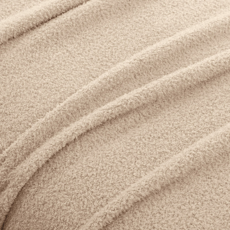 Close-up of beige fabric with visible texture