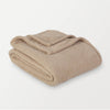 A folded tan Retro Comfort Plush Blanket on a white background.