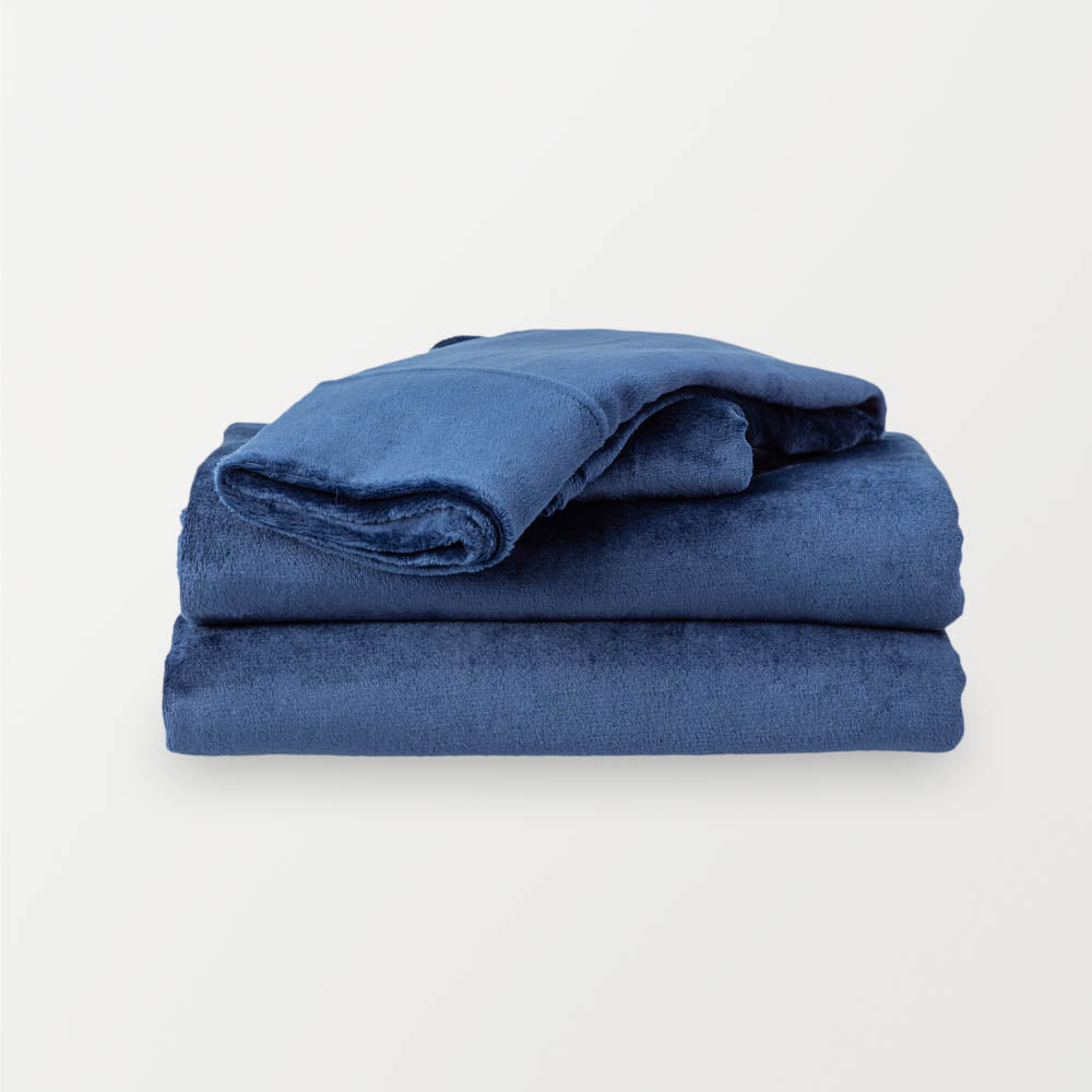 Folded Dress Blue (navy)  sheet set on a white background.