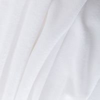 Close-up of white fabric with folds