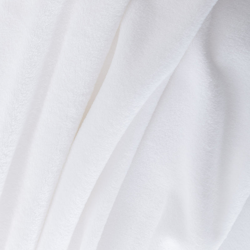 Close-up of white fabric with folds