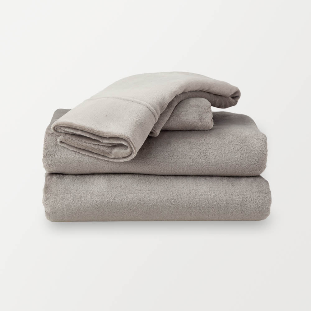 Folded Wild Dove (gray)  sheet set on a white background.