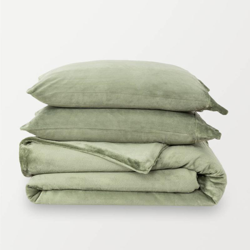 VelvetLoft® Plush Duvet Cover Set in Dark Sage green, neatly folded with two matching pillow shams stacked on top.