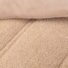 Close up shot to show the two reversible fabrications of the Retro Plush comforter set in Sumatra blend. 