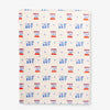 Printed Peanuts 75th Anniversary Throw laid flat on a white surface.