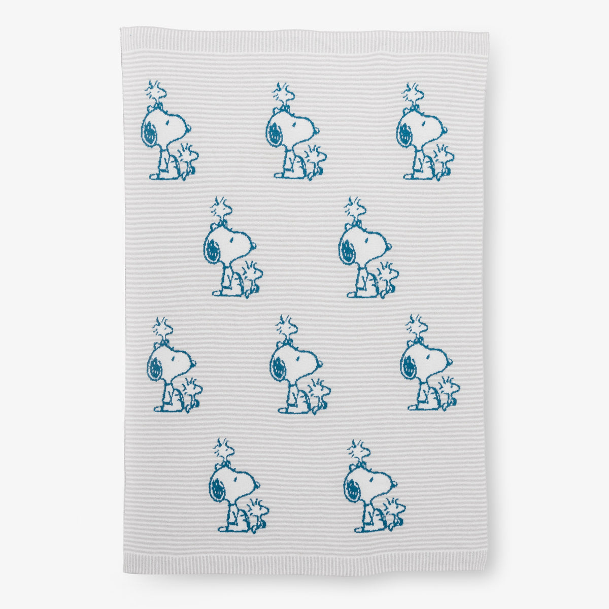 Peanuts striped MellowSoft Throw laid flat on a white surface.